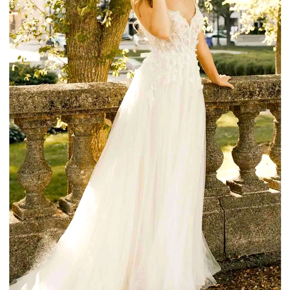 Wedding Dress Designer & Style: All Who Wander, Luca. Bohemian wedding gown.